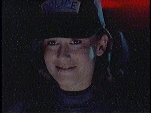In the future, people are too dumb to know you're a cop unless you have a goofy hat with POLICE written in huge letters on the front.
