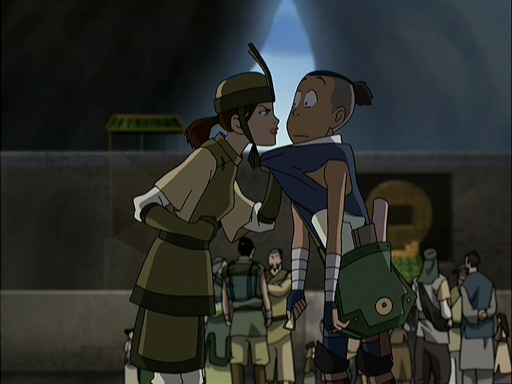 Alas, there is no scene where she throws Sokka off a ferry and exclaims "No ticket."